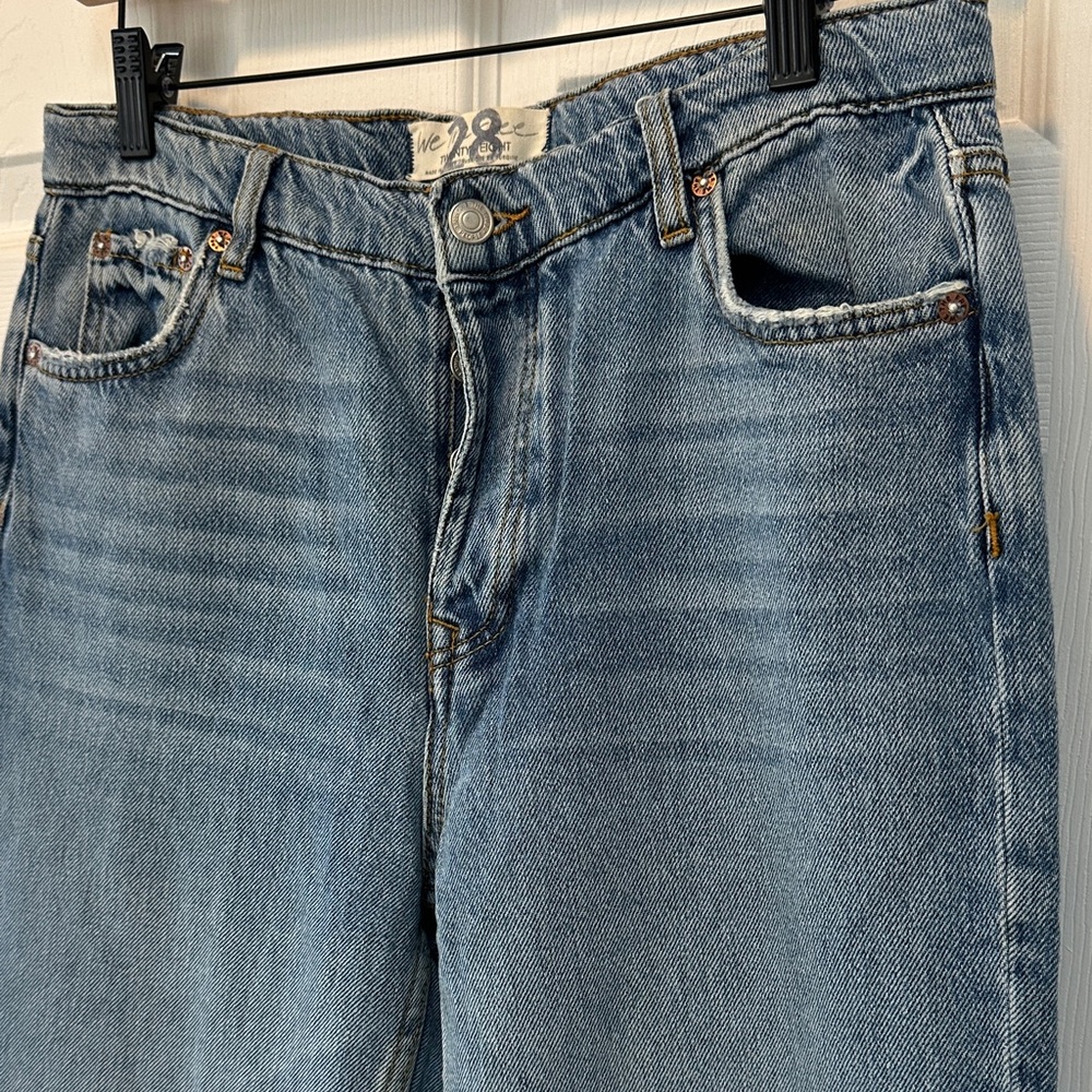 Free People Light Blue Straight Jeans with unique slit ankle detail. Size 28